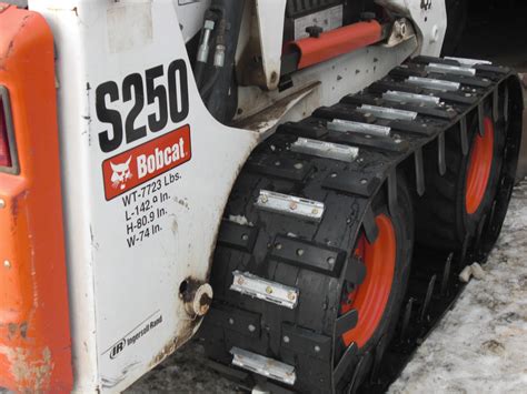 ice cleats for skid steer|ice grip track steer.